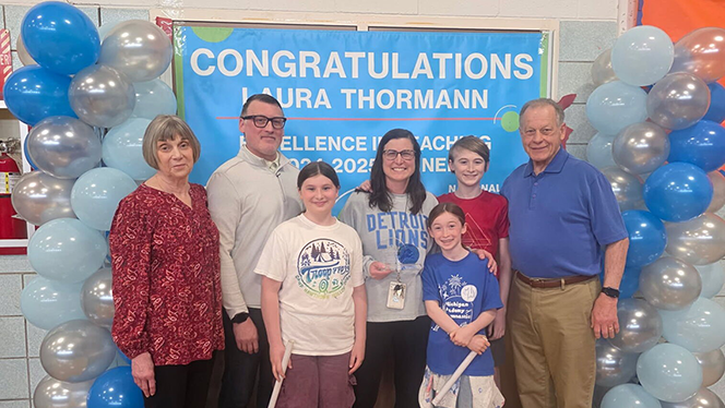 K-8 School in Detroit: Warrendale Charter Academy teacher, Laura Thormann, wins Excellence in Teaching Award.