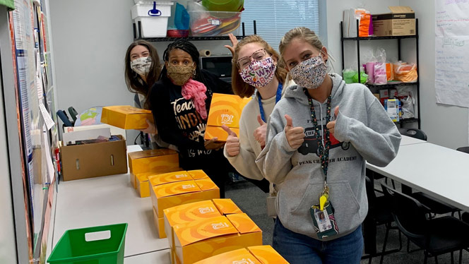 Peak staff giving thumbs up