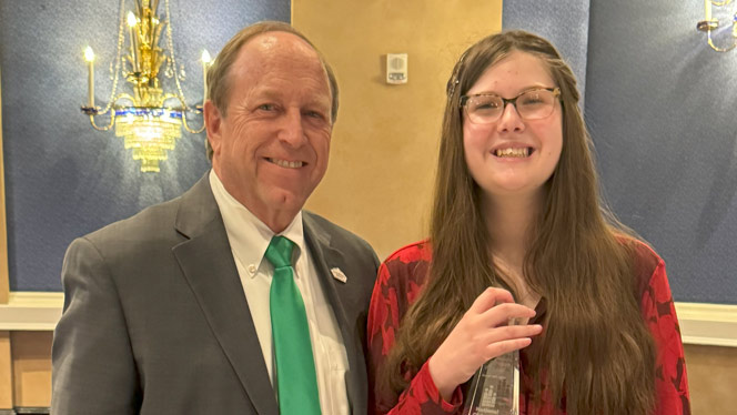 Hastings with former CO Springs Mayor John Suthers.