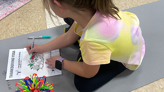 K-8 School in Commerce City: Landmark Academy at Reunion holds a successful Yoga Club.