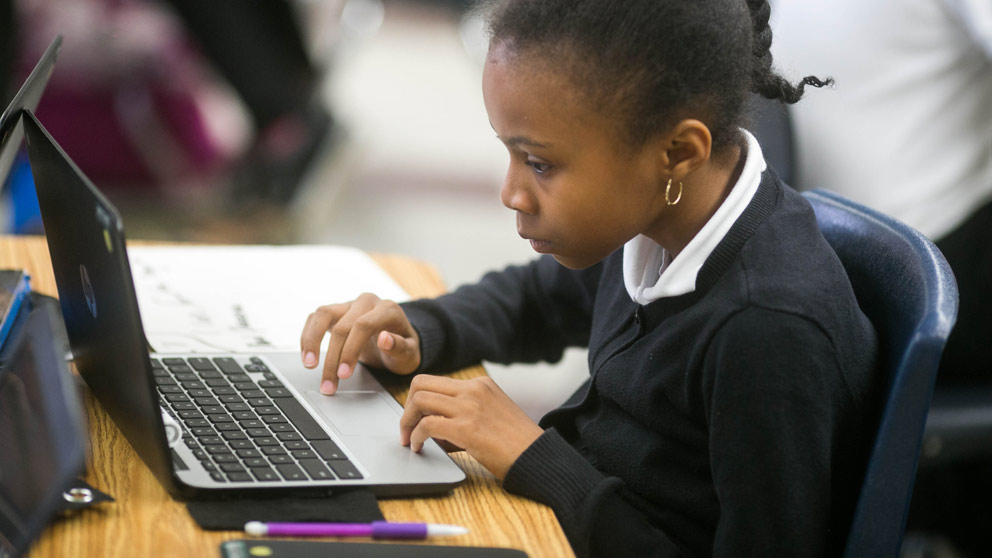 Student Works on a Paper
