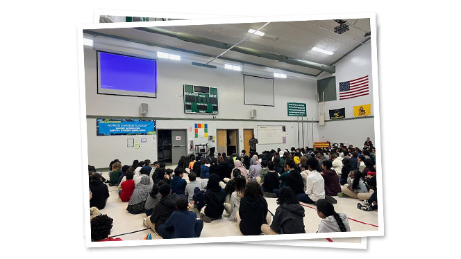 Achieve Charter Academy students listening to guest speaker.