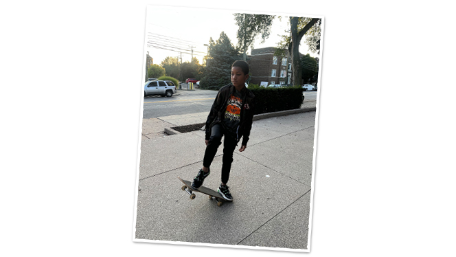 Student on skateboard.