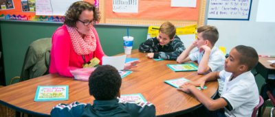 Teacher guides students through activity