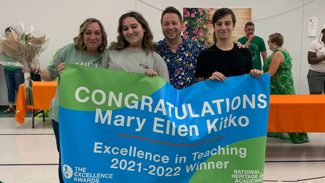 Mary Ellen Kitko receiving Excellence in Teaching award.