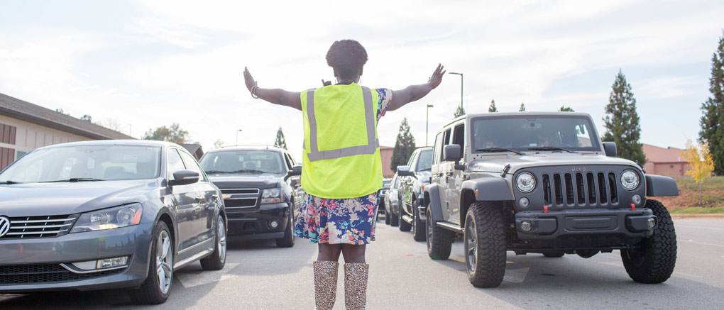 Faculty assisting car line