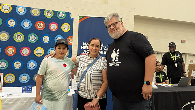 Charter Schools in Grand Rapids: National Heritage Academies partnered with In The Image Shoes Event to provide a pair of shoes to students.