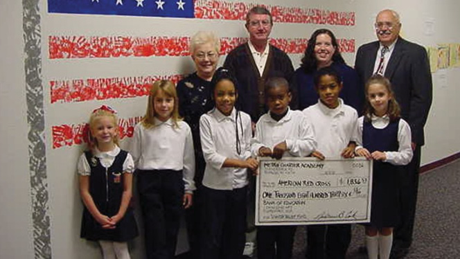 Charter School in Grand Rapids: NHA parent turned employee celebrates 25 years.