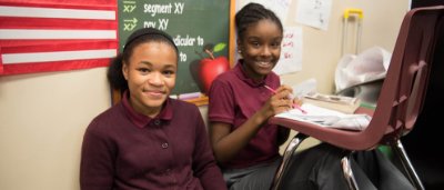 K-8 School in Gary: Students working on class work.