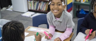 Students completing work in classroom