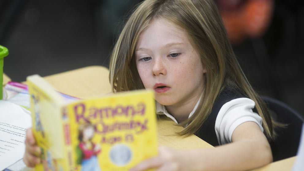 Student reading a book