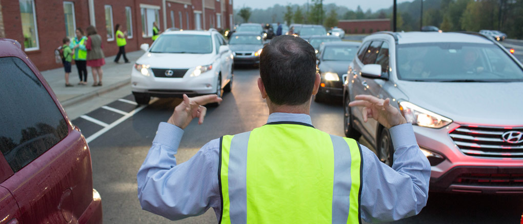 Staff directing traffic