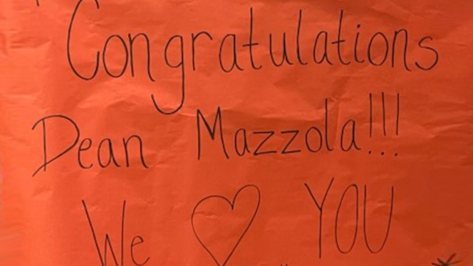 A sign congratulating Ninfa Mazzola.