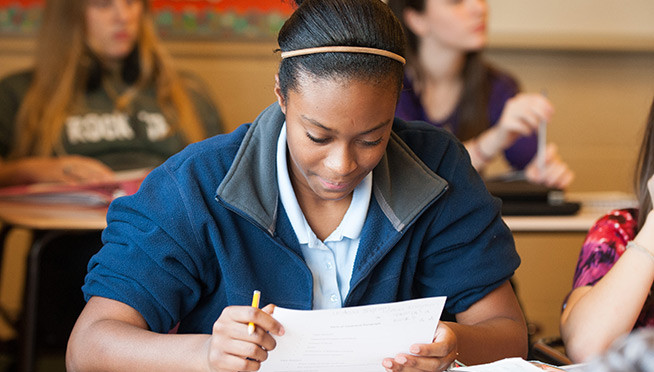 Student Works on a Paper