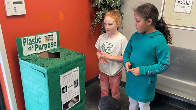 Students learning about recycling.