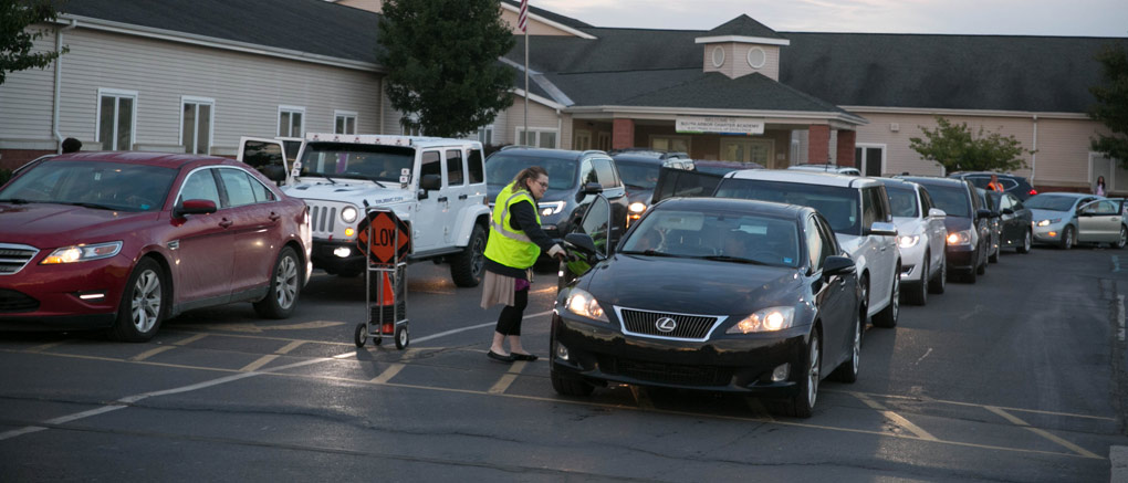 Helping with student pick-up