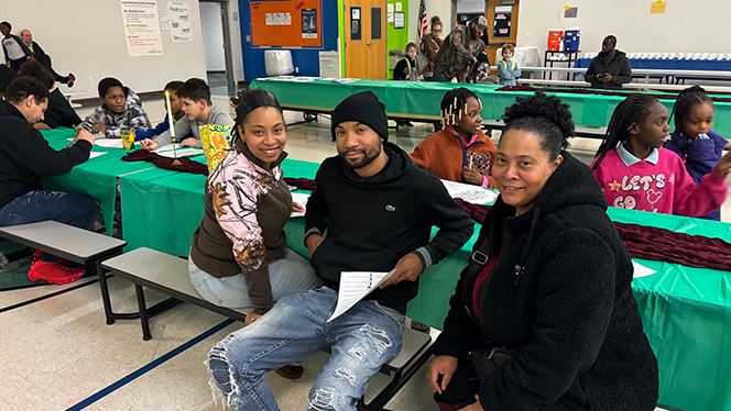 K-8 School in Cincinnati: Orion Academy families gather for a Thanksgiving meal.
