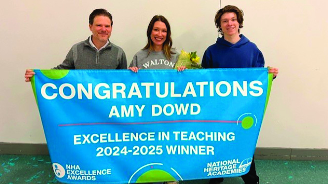 Y5-8 School in Pontiac: Walton Charter Academy teacher, Amy Dowd, wins Excellence in Teaching Award.