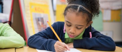 Brooklyn Dreams Charter School, K-8 School in Brooklyn, NY: student completing work.