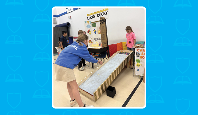 K-8 School in Mint Hill: Queen's Grant fourth graders host their annual Economic Fair.