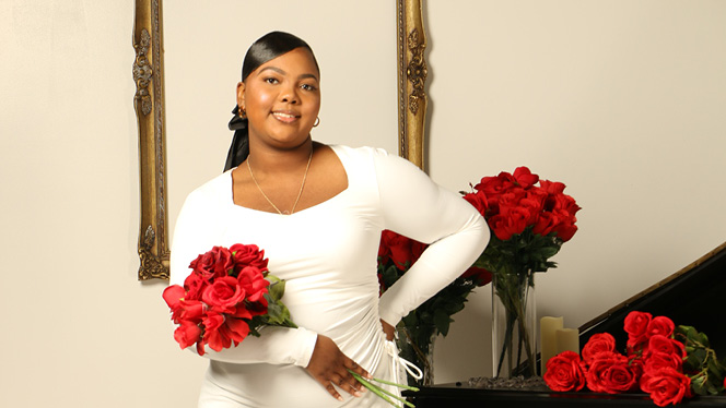 K-12 School in Center Line: 2025 graduate, Kayla Washington, poses for a photo.