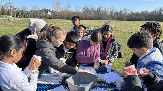 South Canton student group working outside.