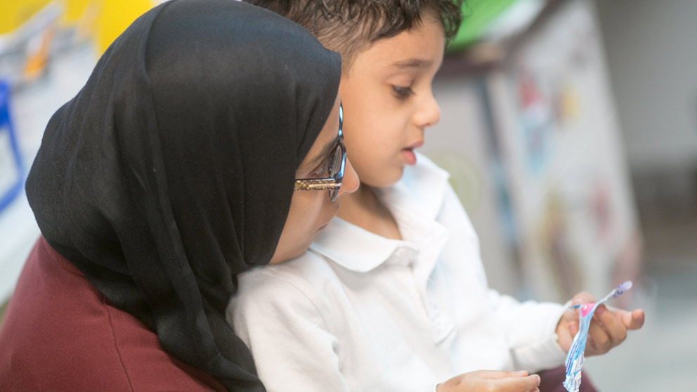 Parent picking up student from class
