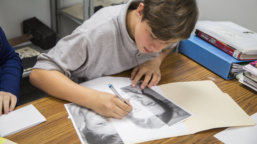 Student Works on a Paper
