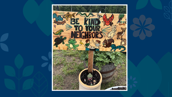 K-8 School in Greensboro: Gate City fifth graders help bring community garden alive.