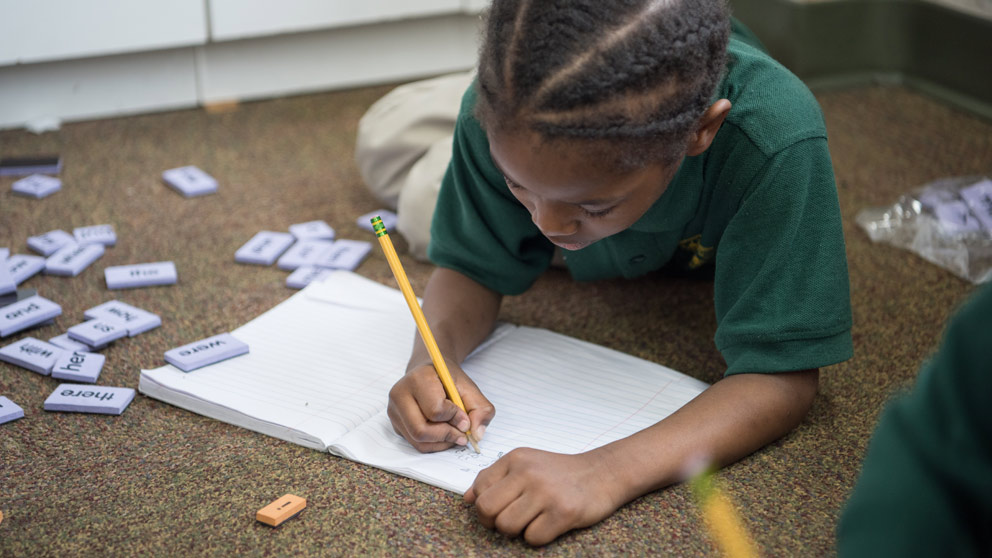 Student Works on a Paper