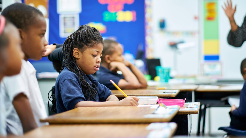 Student works on paper