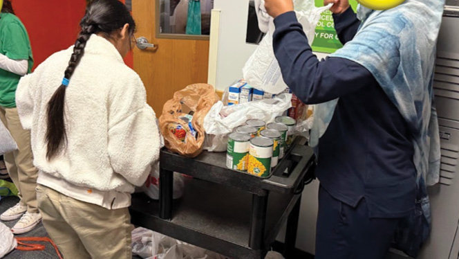 K-8 School in Canton: Achieve Charter Academy NHJS students and alumni organize a winter clothing drive.