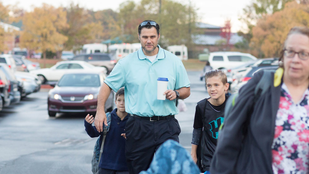 Parent picking up student from class