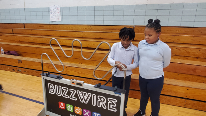 Students playing Buzzwire.