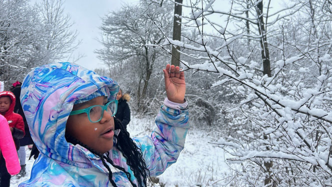 South Canton student outside in the snow.