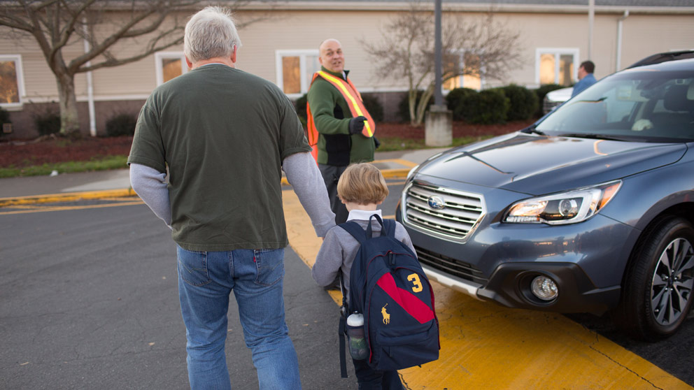 Parent picking up student from class
