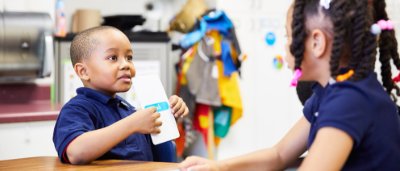 K-8 School in E. Cleveland: Students using flashcards together.