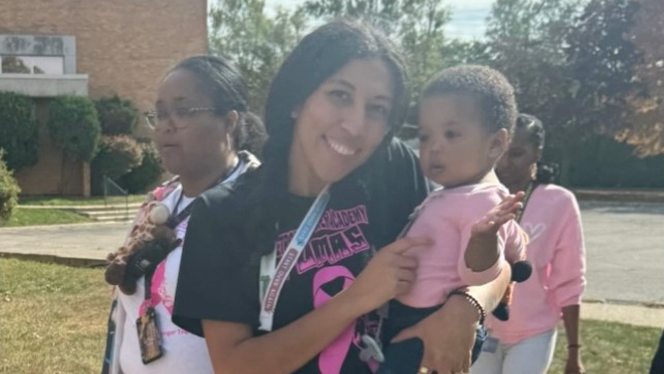 K-8 School in Detroit: Detroit Premier students, families, and staff participate in Breast Cancer Awareness walk.
