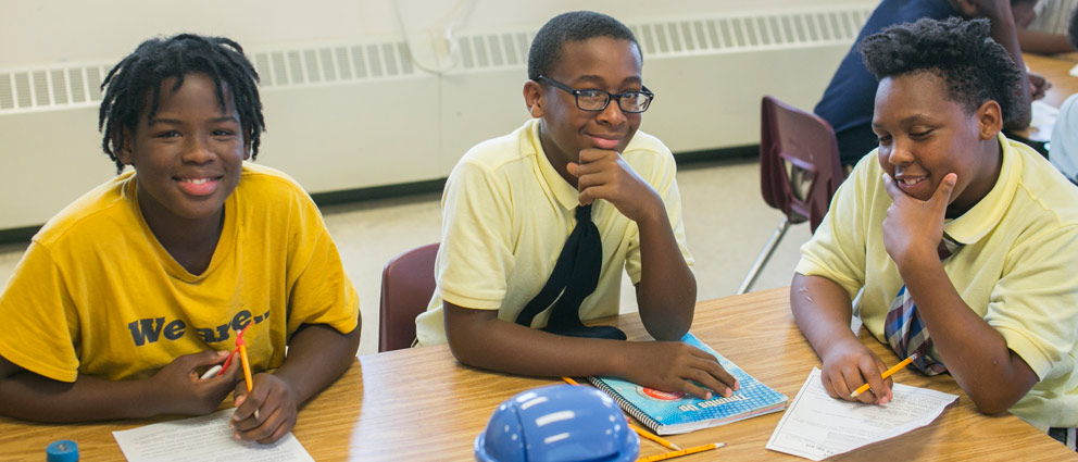 Teacher helping student