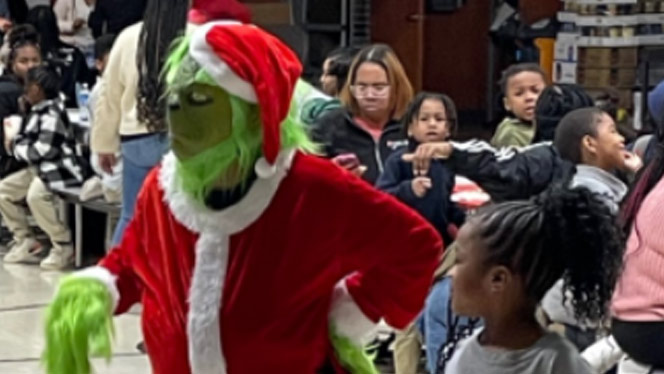 Zele as the Grinch for story time