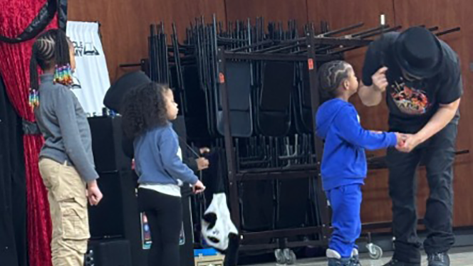 K-8 School in Euclid: Pinnacle Academy hosts a magic show during an open house event.