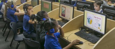 Students completing work on computer