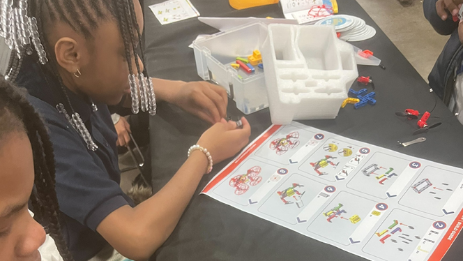 K-8 School in Detroit: Detroit Enterprise Academy fourth and fifth graders participate in CODE313's annual STEAM Slam.