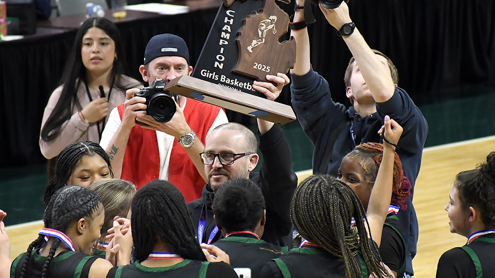 Arbor Prep Girls' Basketball Team celebrating winning the state championship