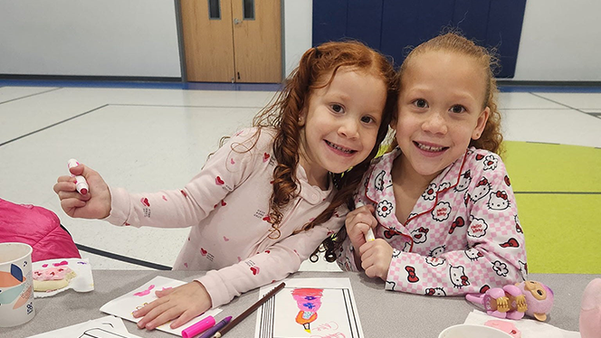 K-9 School in Watkins: Sky Ranch Academy hosts its first Literacy Night.