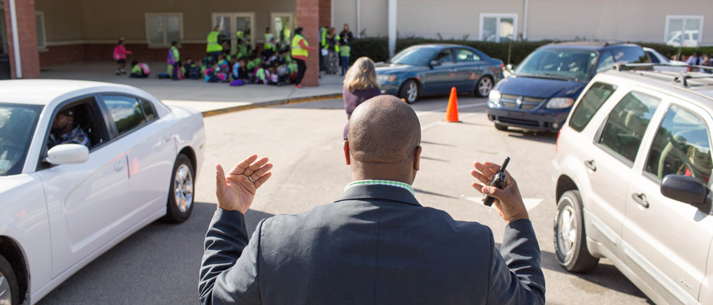 Faculty assisting car line