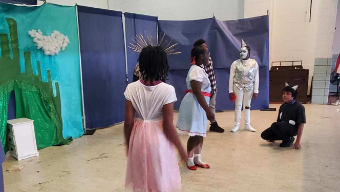 Students acting out Wizard of Oz